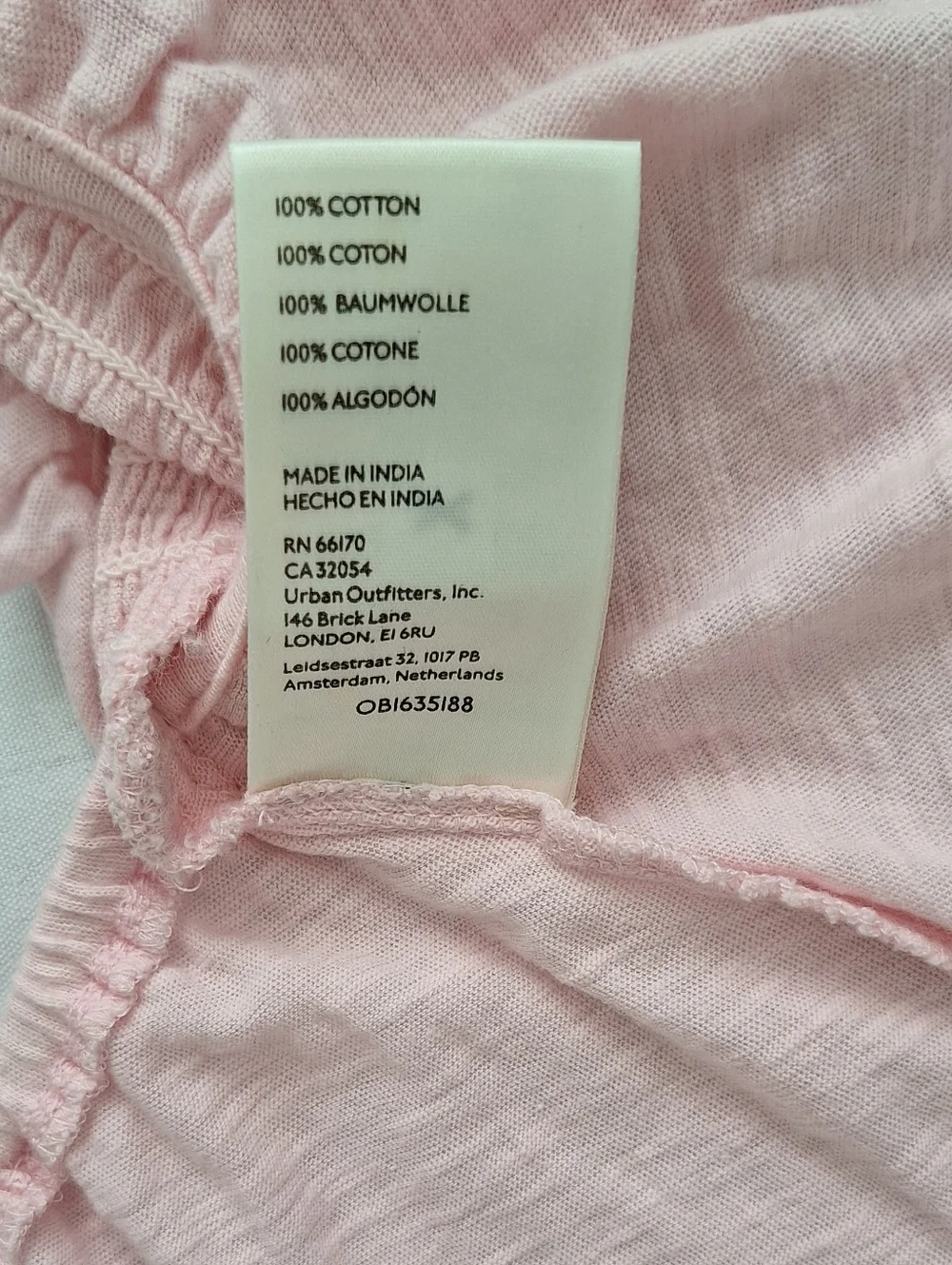 Free People Light Pink Smocked V-Neck Peplum Blouse